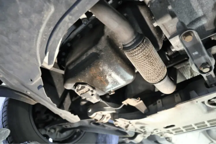Oil leak from under the vehicle near engine